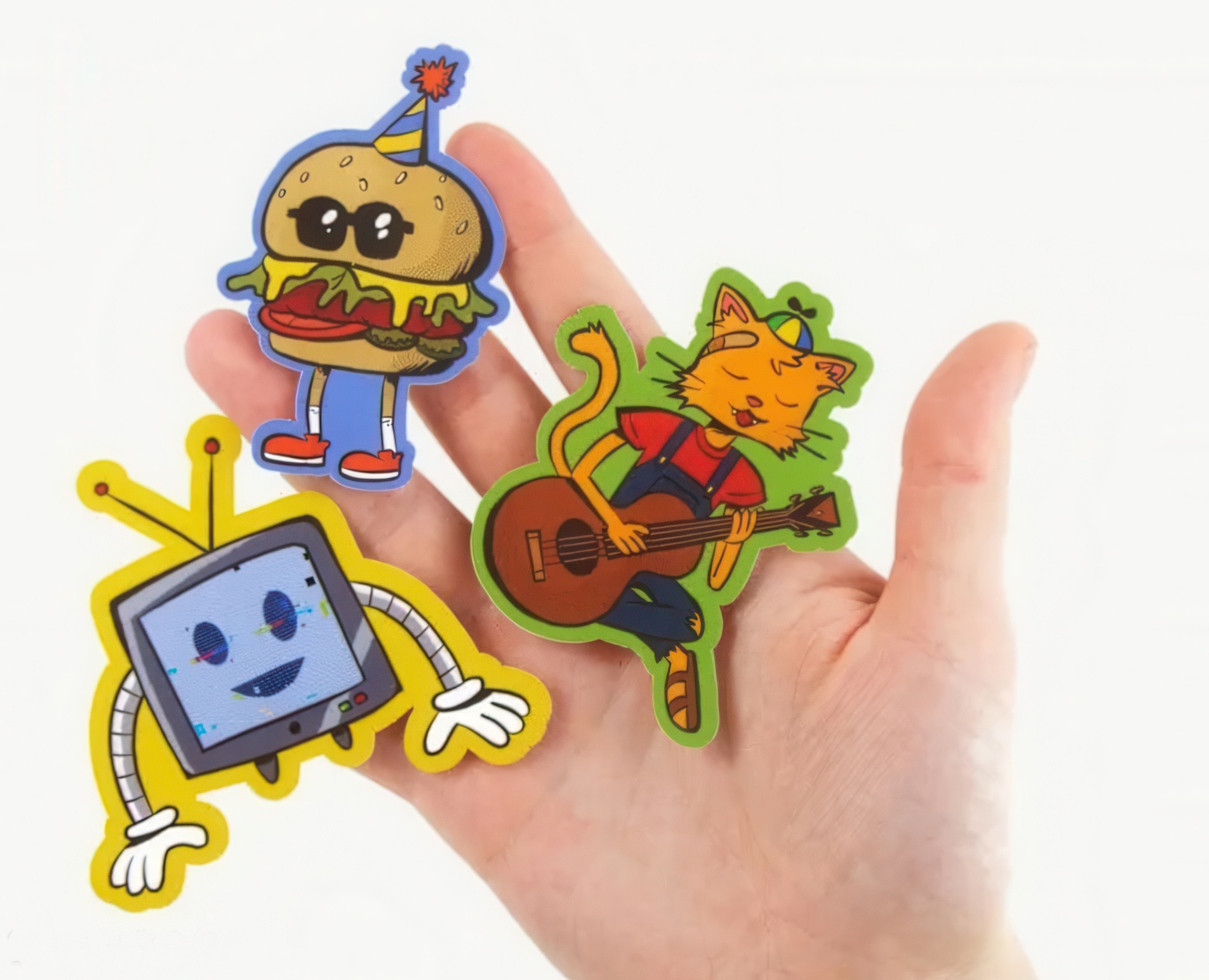 Hand holding playful stickers